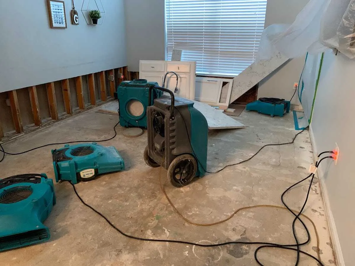 Dehumidifier in flood-cut room for Water Damage Restoration in Rumson